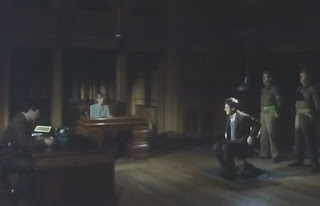 Screenshot from Spy! Episodee 2 - Camp 020 - BBC - 1980 Hans Hansen (Wulf Schmidt) undergoes his first interrogation at Camp 020 by Lt. Duthie.