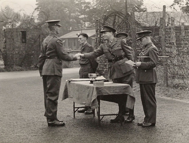 Regimental Sergeant Major shaking hands with a smiling Lt. Col. R.W.G. Stephens (Copyright 2021 Pete MacKean - used with permission).