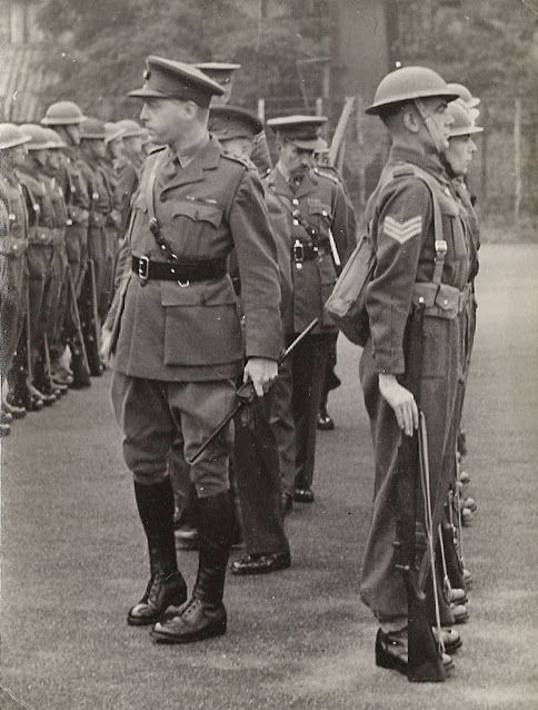 Lt. Col. R.W.G. Stephens inspecting troops at Camp 020.
