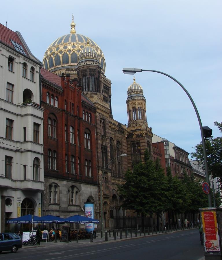 Berlin - New Synagogue at Oranienburger Strasse 29-31. The Jüdische Gemeinde zu Berlin is housed in Oranienburger Strasse 28, the red brick building just to the left of the synagogue. (Copyright 2010, G.K. Jakobs) 