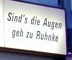 Storefront with Optiker Ruhnke's slogan