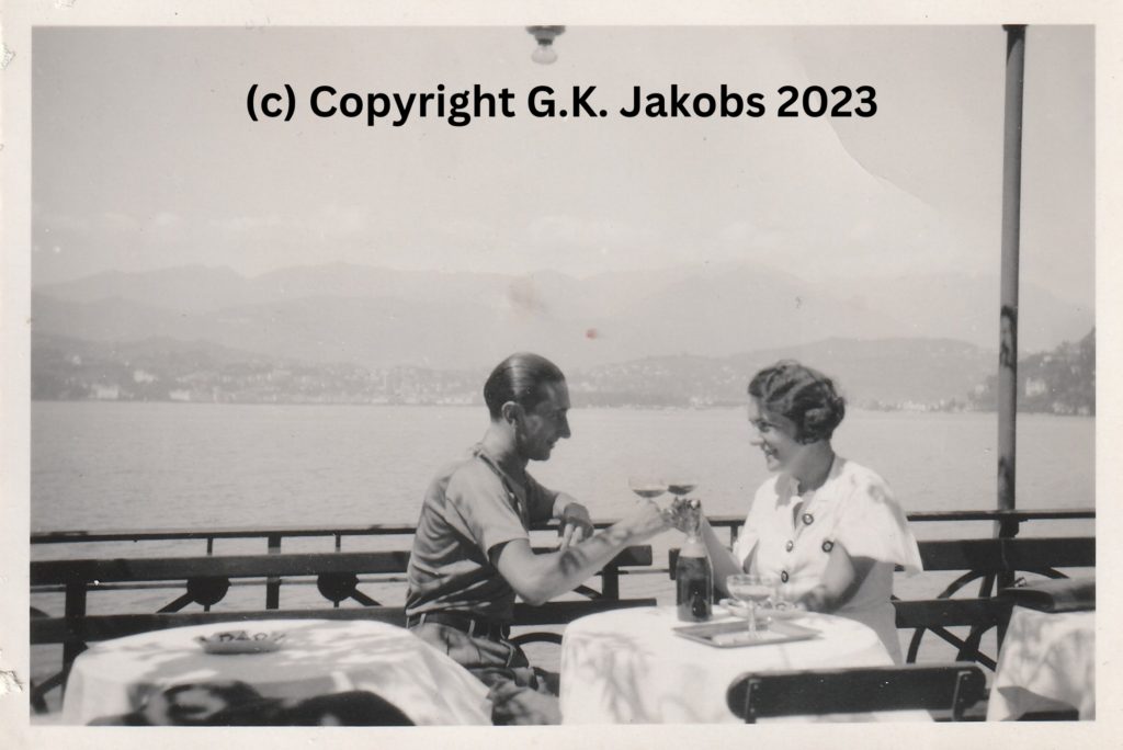 Margarete Jakobs and a Mystery Man (possible Werner Adolf Goldstein) sharing a toast in July/August 1934,
likely somewhere along Lake Lucerne. Copyright G.K. Jakobs 2023