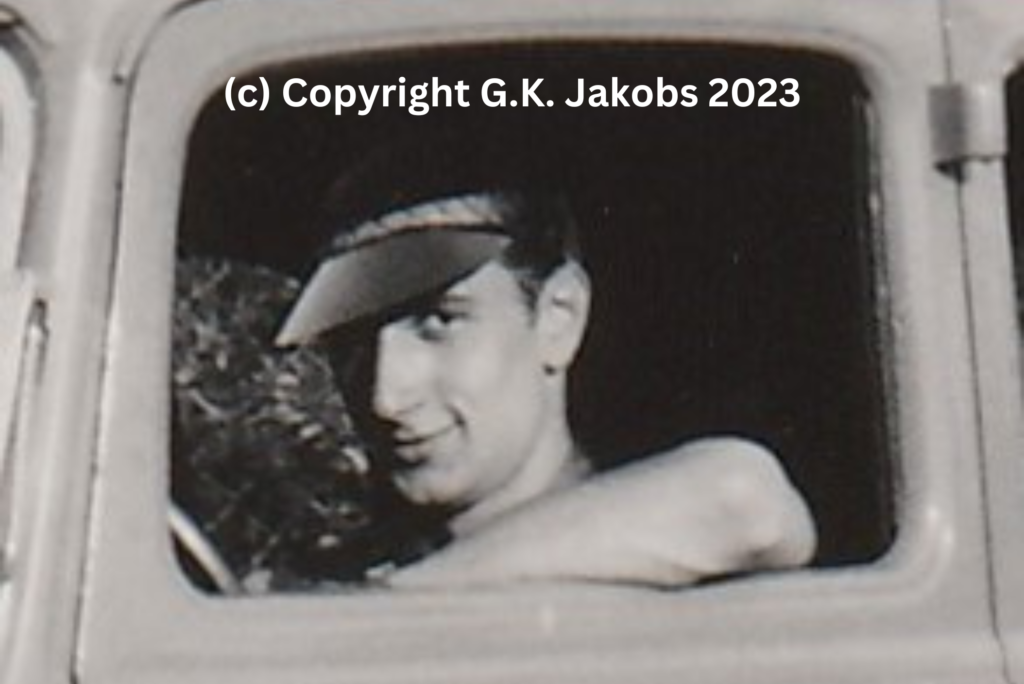 Close-up of the Mystery Man in the driver's seat of the vehicle used by Josef and Margarete Jakobs in July/August 1934. Location unknown. Copyright G.K. Jakobs 2023.
